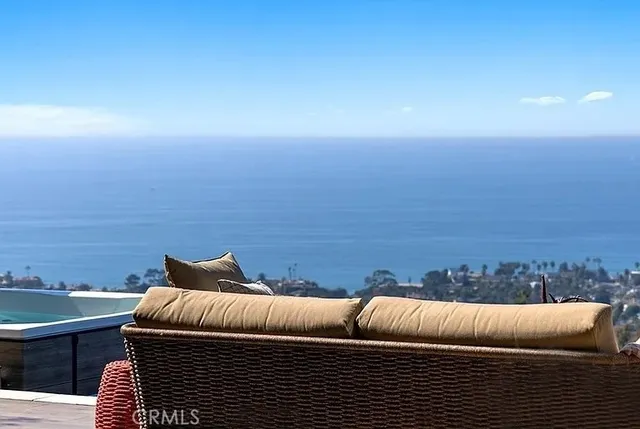 a view of a dining room with furniture and window