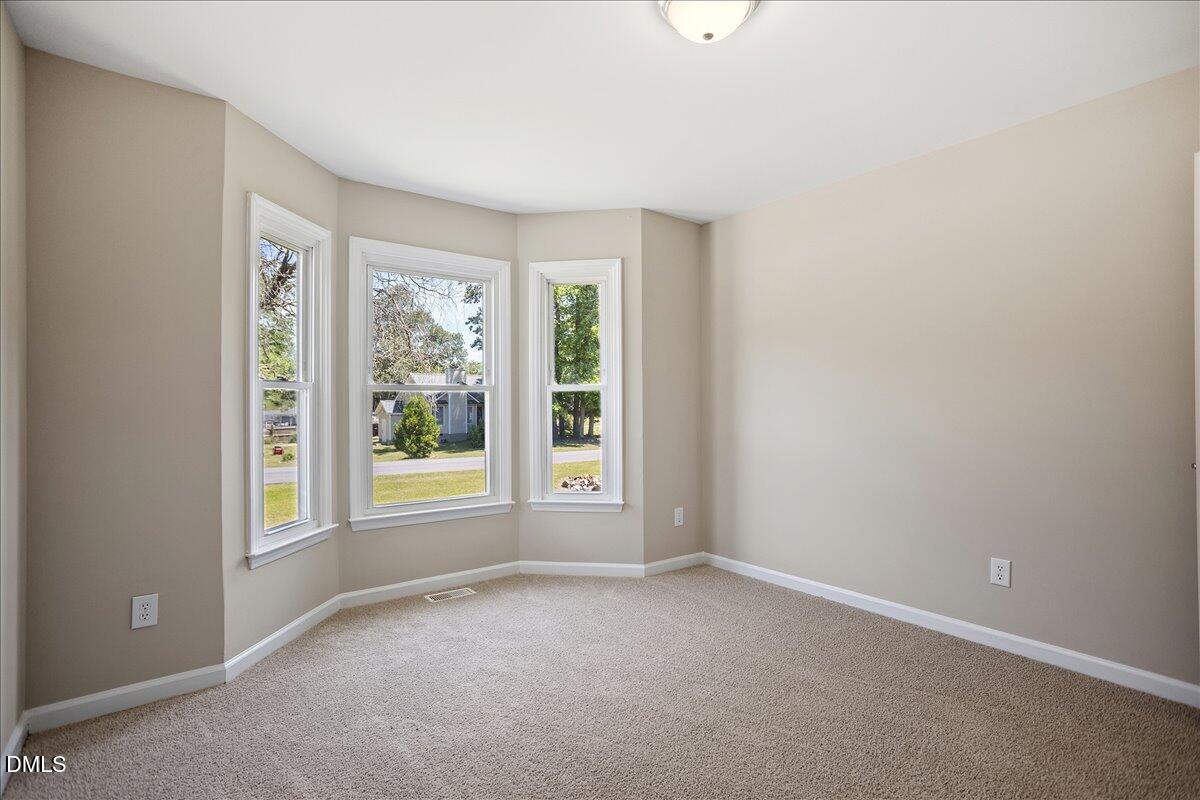 31 Fieldview Court Angier, NC 27501 - Photo 15 of 25 an empty room with windows