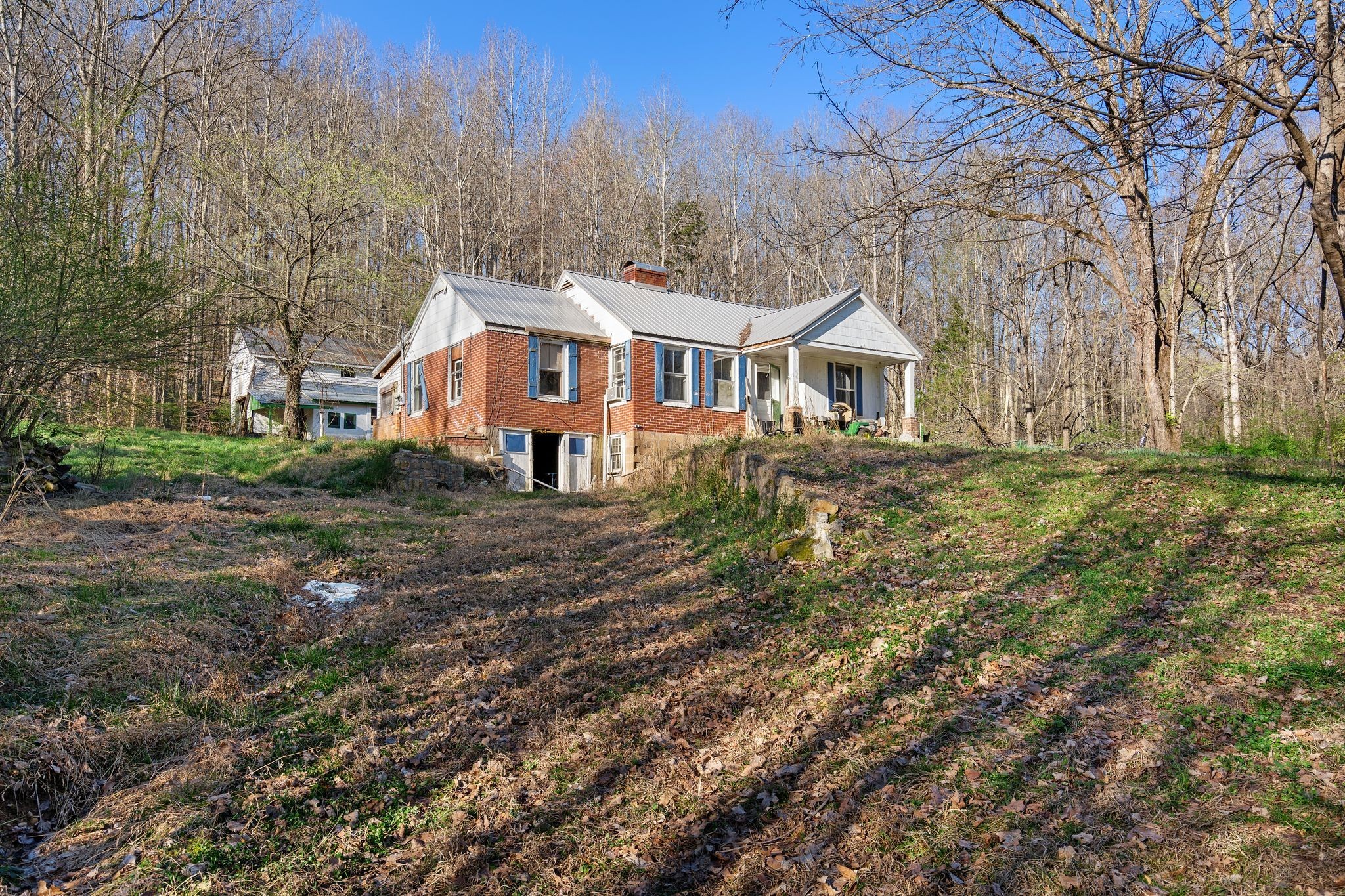 9208 Hester Beasley Road Nashville, TN 37221 - Photo 3 of 5 a front view of a house with a yard