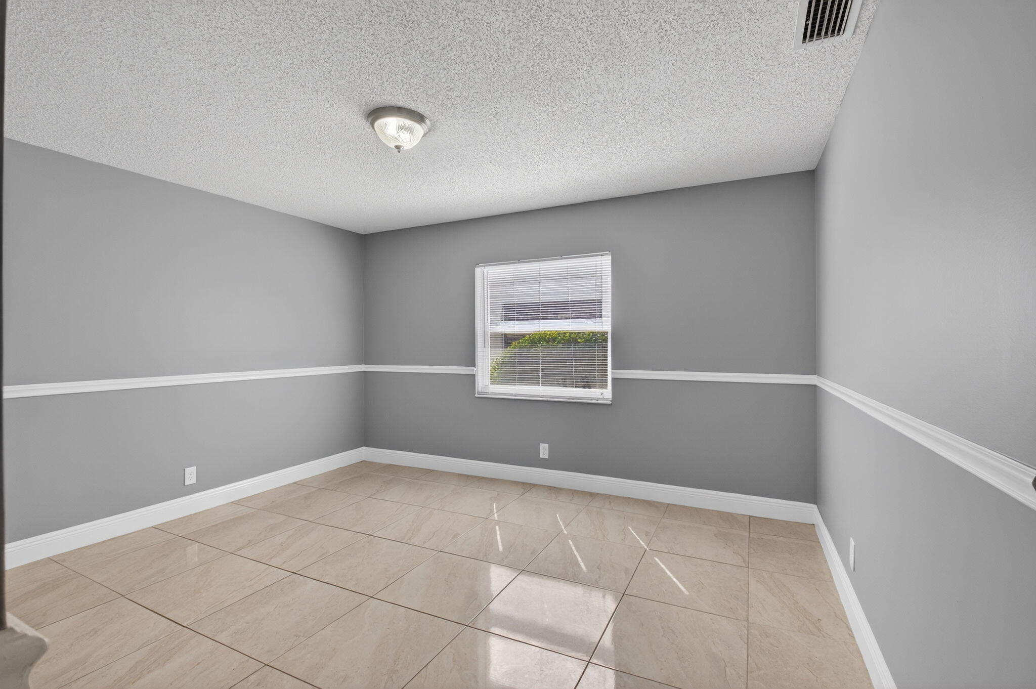 18093 104th Terrace South Boca Raton, FL 33498 - Photo 20 of 43 a view of an empty room with a window