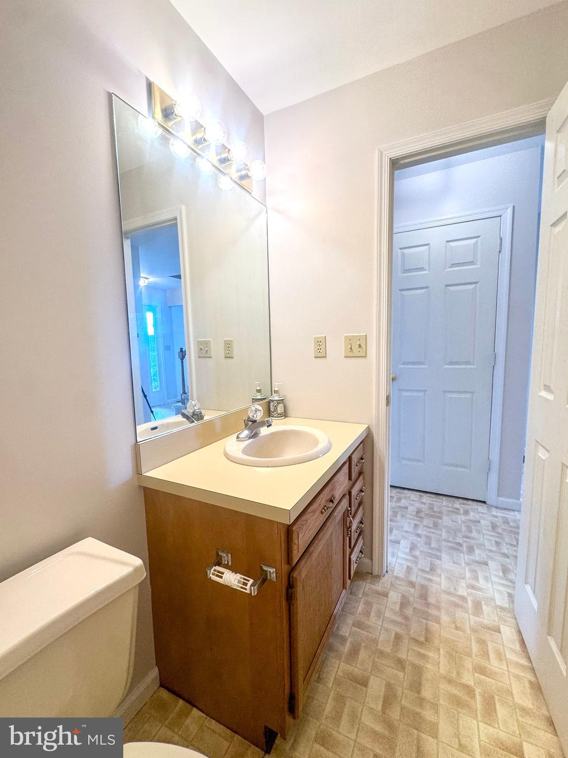 619 Stoney Run Road Pottsville, PA 17901 - Photo 17 of 41 a bathroom with a sink a toilet and mirror