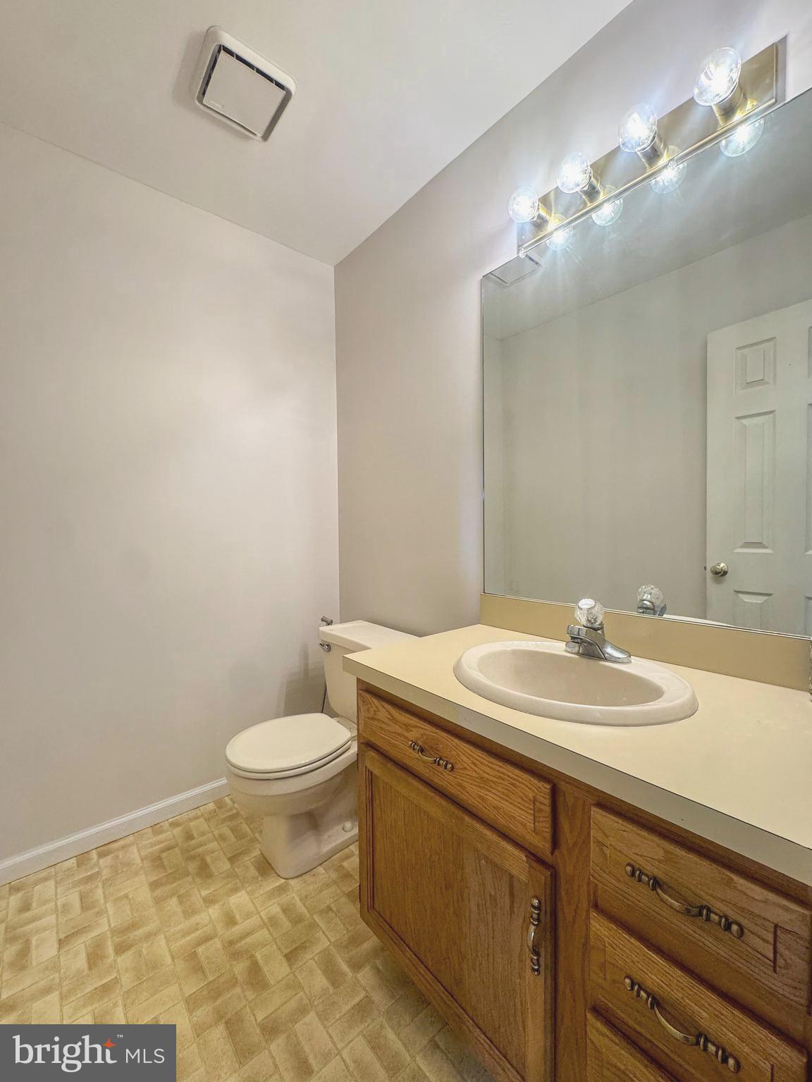 619 Stoney Run Road Pottsville, PA 17901 - Photo 18 of 41 a bathroom with a sink a toilet and a mirror