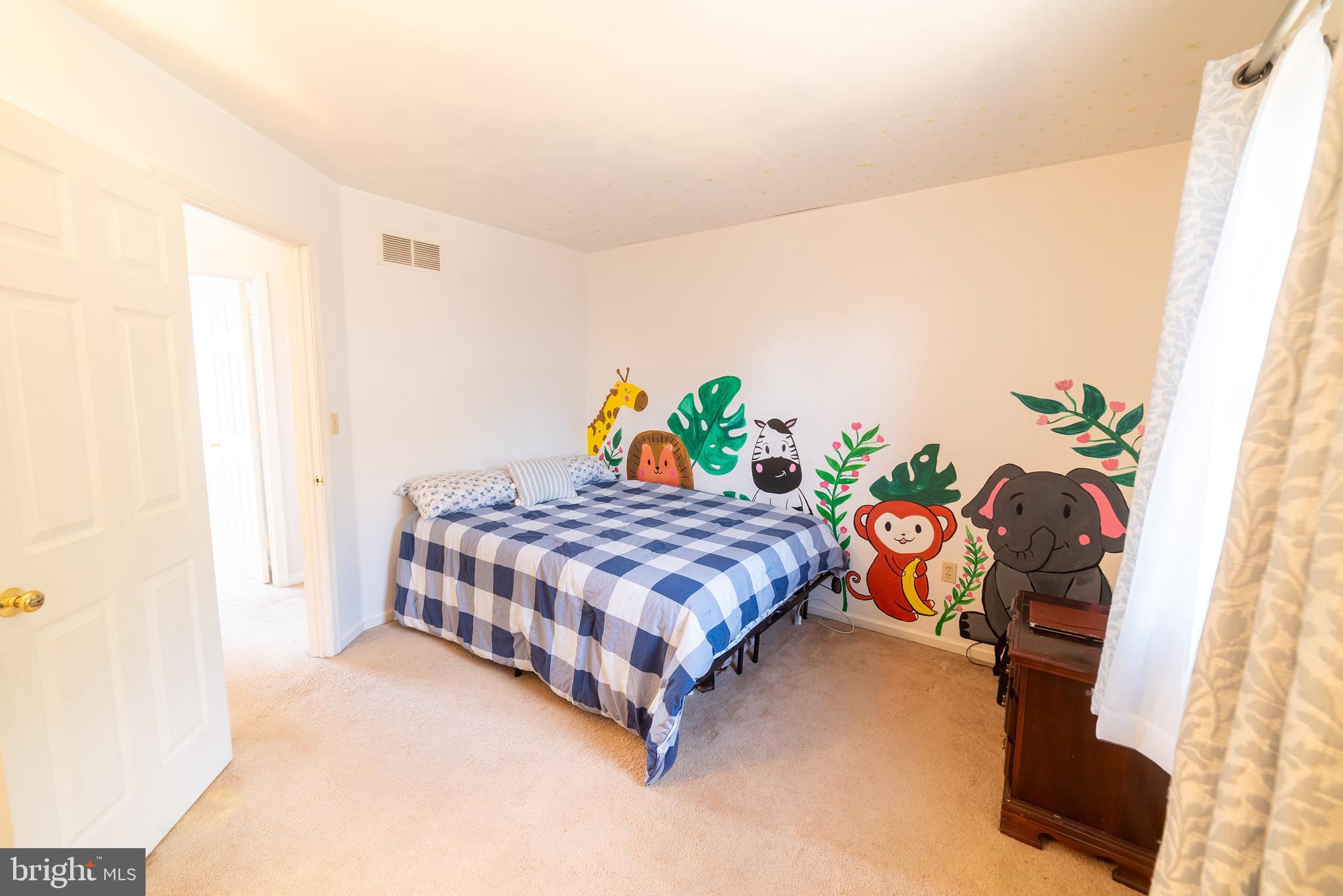 619 Stoney Run Road Pottsville, PA 17901 - Photo 22 of 41 a bedroom with a bed table and a couch