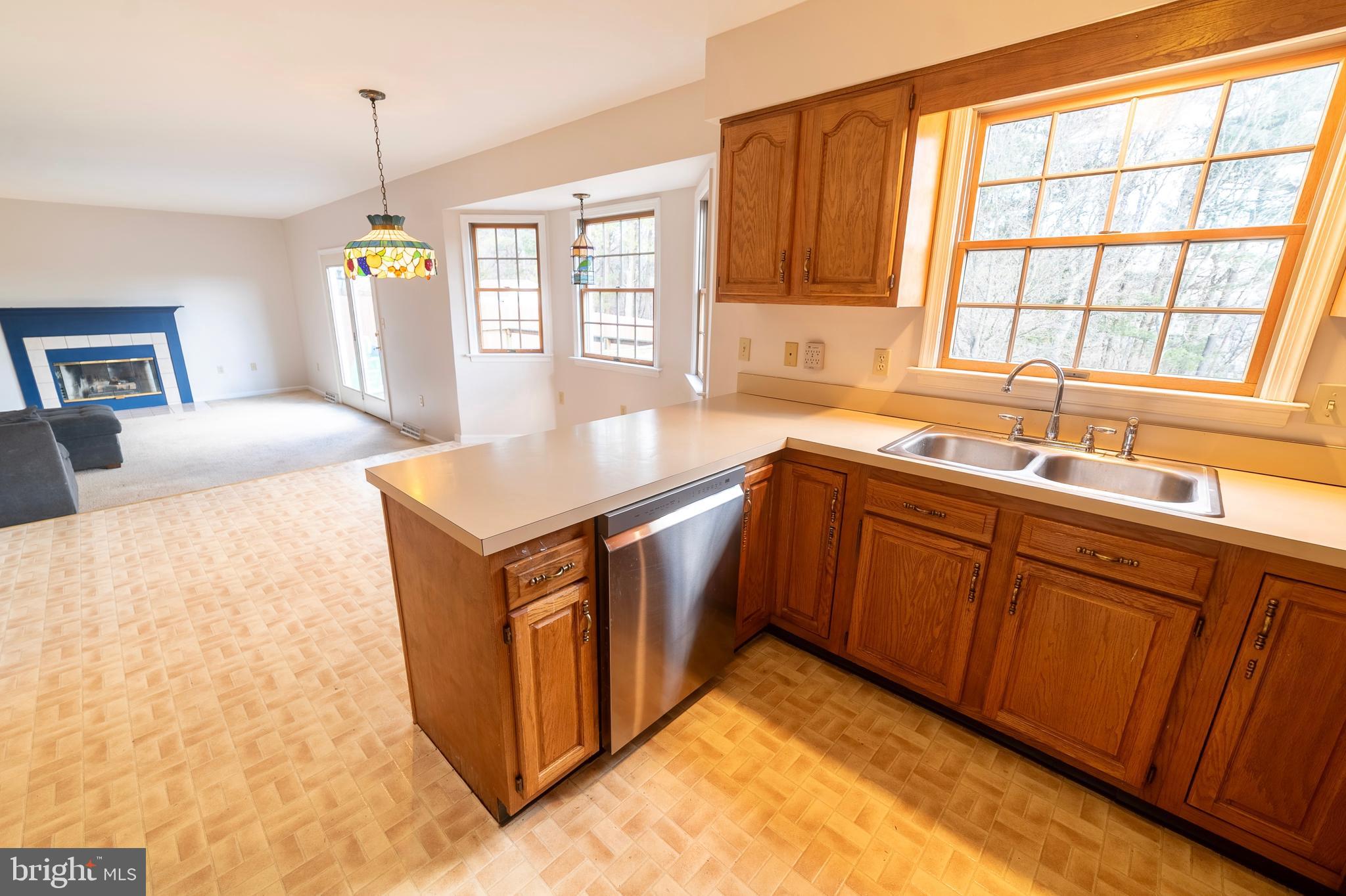 619 Stoney Run Road Pottsville, PA 17901 - Photo 7 of 41 a kitchen with stainless steel appliances granite countertop a sink and a stove