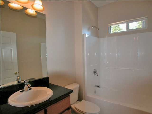 4630 Hermosa Road Crestview, FL 32539 - Photo 8 of 29 a bathroom with a sink and a mirror
