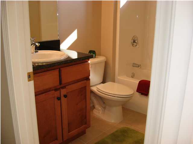 4630 Hermosa Road Crestview, FL 32539 - Photo 9 of 29 a bathroom with a toilet and a mirror