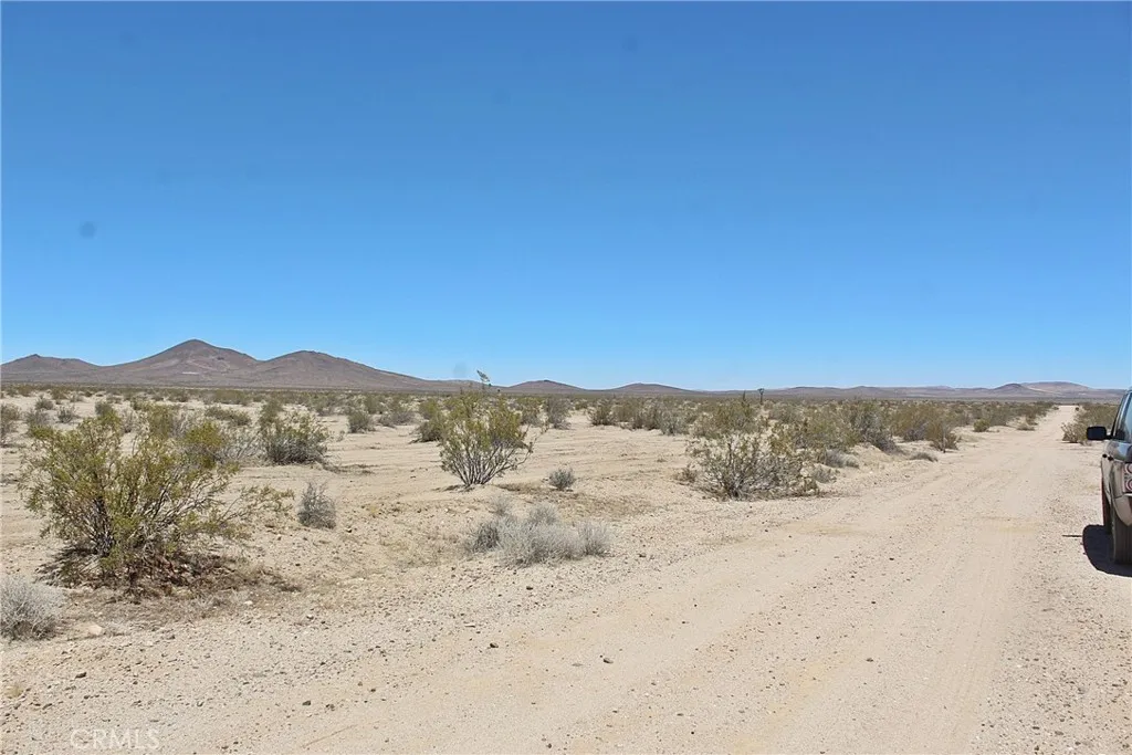 1111 Apache Road Adelanto, CA 92301 - Photo 3 of 8 a view of sky view and mountain view