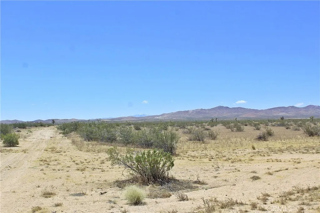 1111 Apache Road Adelanto, CA 92301 - Photo 4 of 8 a view of mountain with sunset view