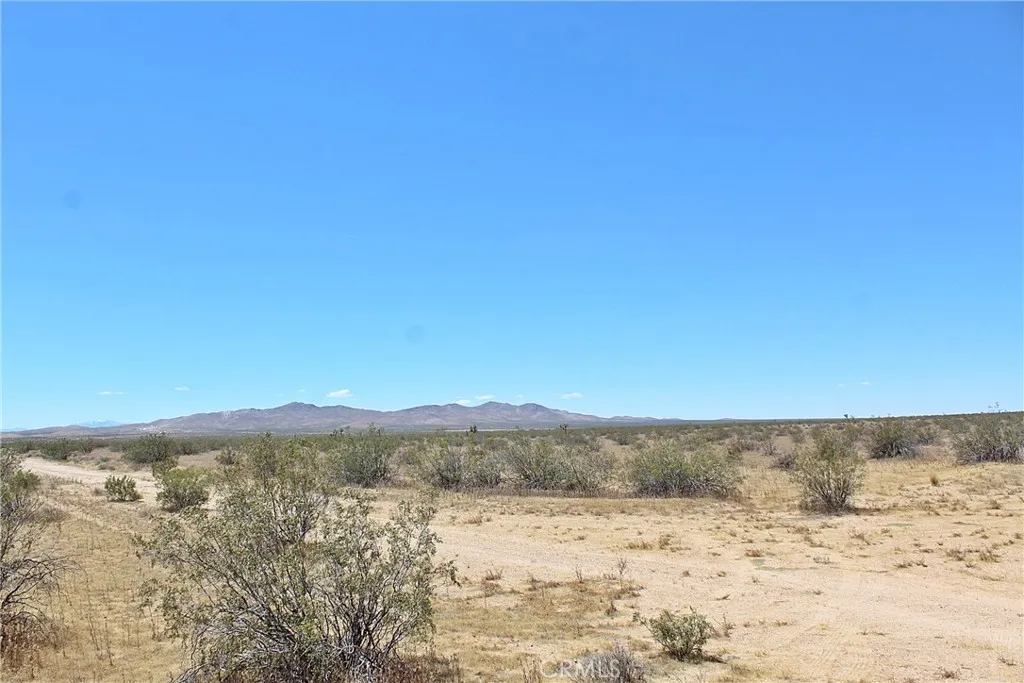 1111 Apache Road Adelanto, CA 92301 - Photo 5 of 8 a view of sky view and mountain