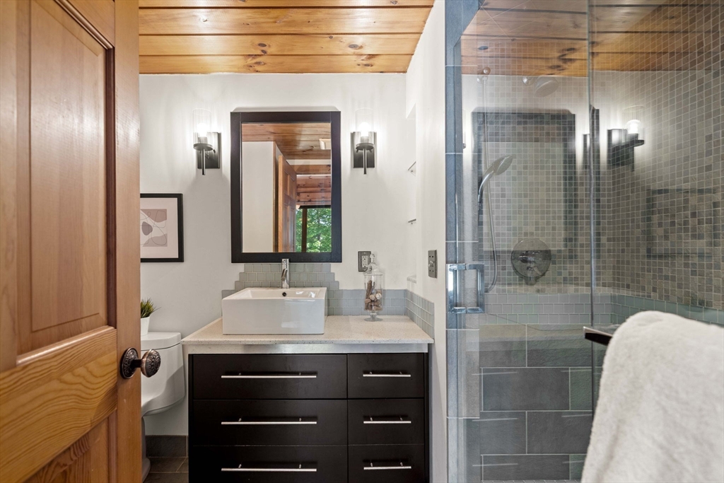 3 Whitman Place Beverly, MA 01915 - Photo 15 of 34 a bathroom with a sink and a mirror