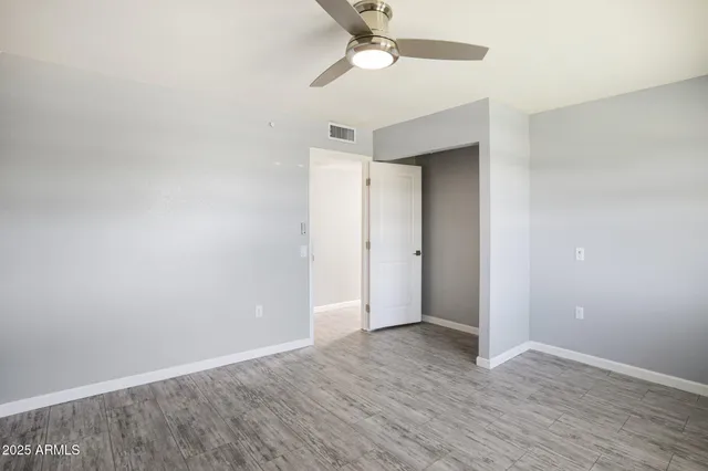 a bathroom with a sink mirror toilet and bathtub