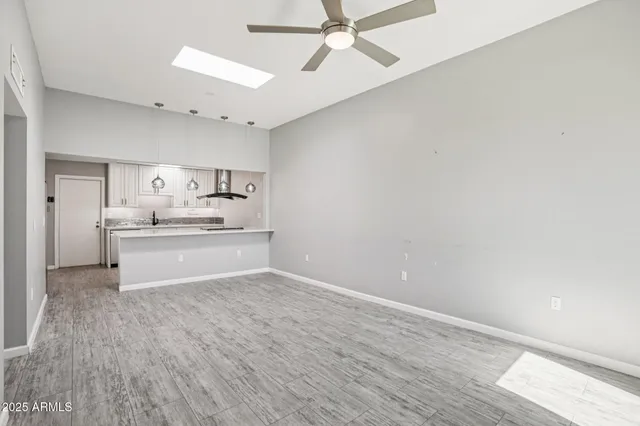 a view of kitchen with wooden floor