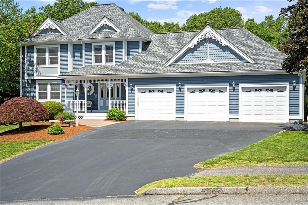 27 Crestview Drive Uxbridge, MA 01569 - Photo 1 of 39 a front view of a house with a yard and garage