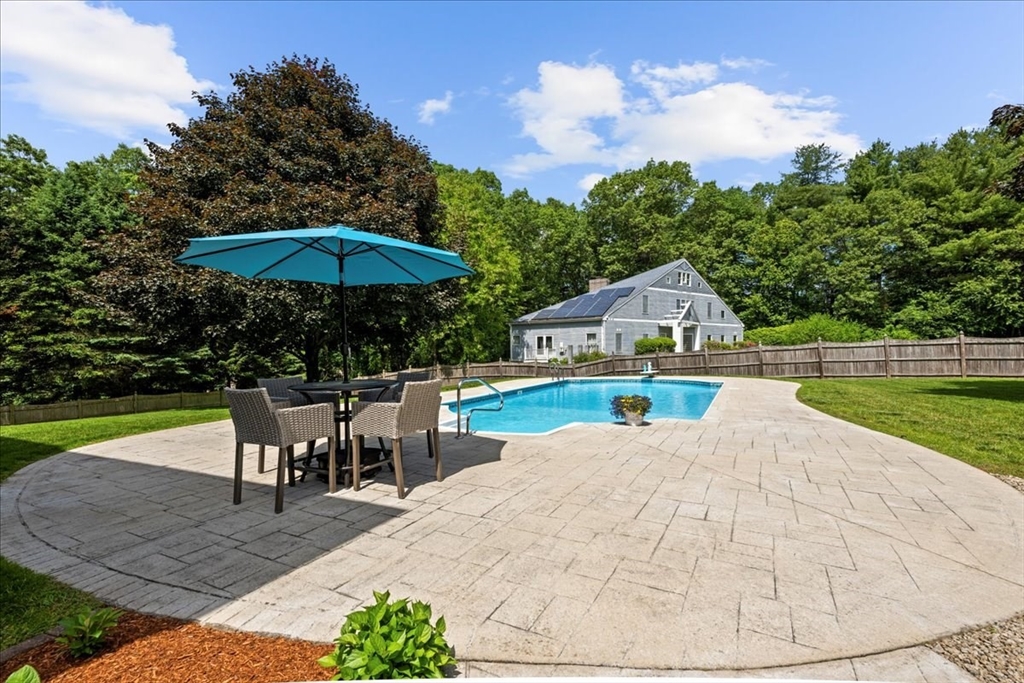 27 Crestview Drive Uxbridge, MA 01569 - Photo 23 of 39 a view of a house with swimming pool and sitting area