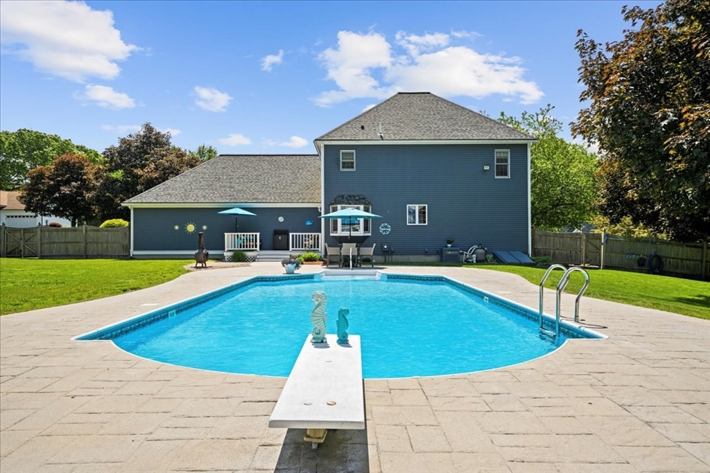 27 Crestview Drive Uxbridge, MA 01569 - Photo 25 of 39 a view of a house with swimming pool and a yard