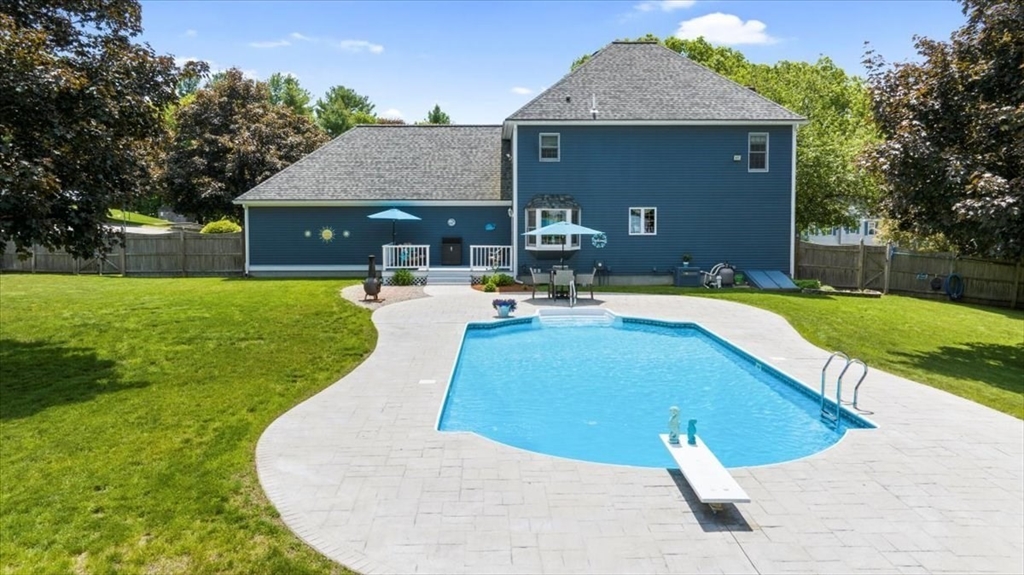 27 Crestview Drive Uxbridge, MA 01569 - Photo 30 of 39 a view of a house with swimming pool