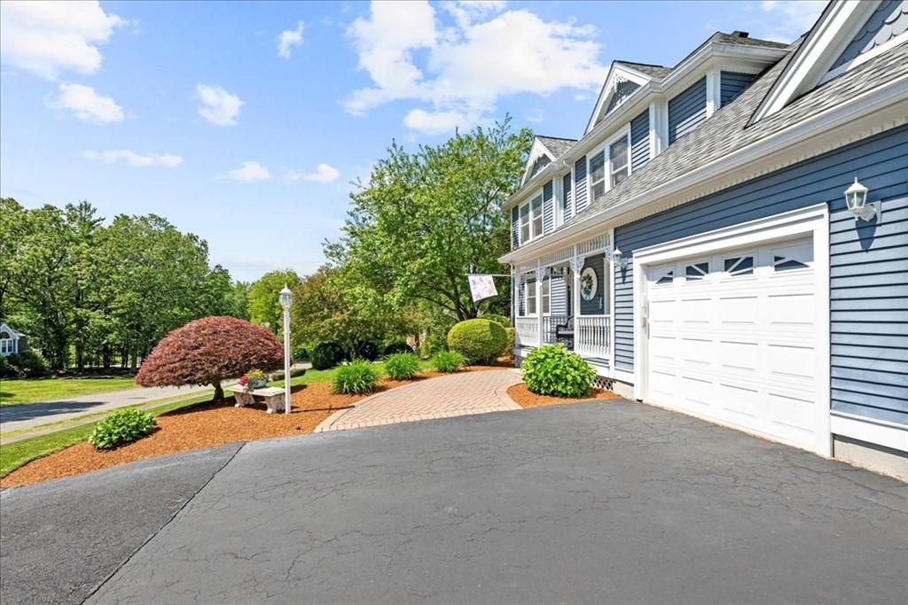 27 Crestview Drive Uxbridge, MA 01569 - Photo 32 of 39 a view of a house with a yard and pathway