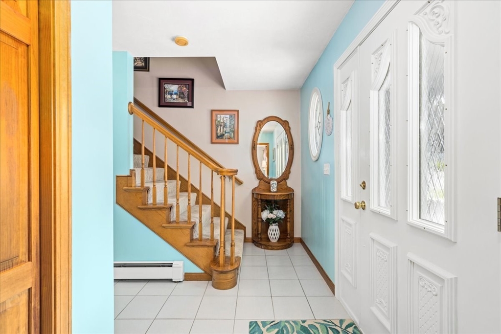 27 Crestview Drive Uxbridge, MA 01569 - Photo 9 of 39 a view of entryway with a front door
