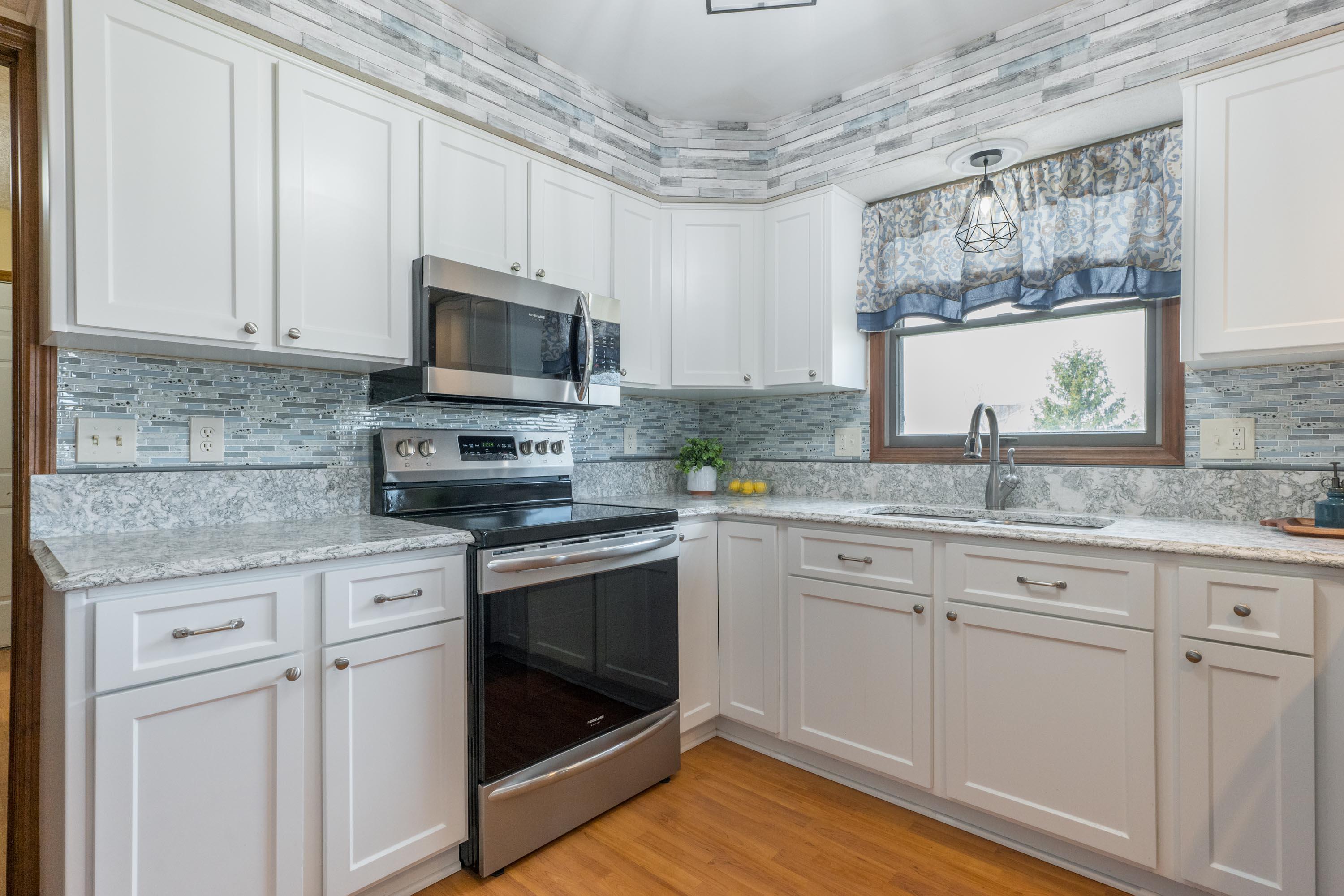 8378 Opossum Run Road London, OH 43140 - Photo 18 of 74 electric oven, built-in microwave.