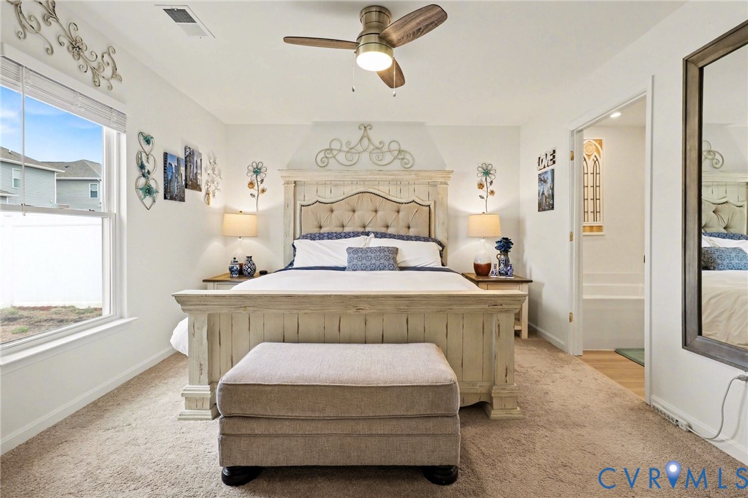 17075 Rollins Road Bowling Green, VA 22427 - Photo 12 of 23 a bedroom with a bed and window