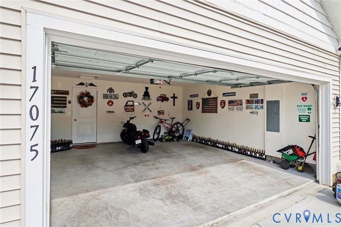 17075 Rollins Road Bowling Green, VA 22427 - Photo 15 of 16 a view of a garage with rack and bicycle