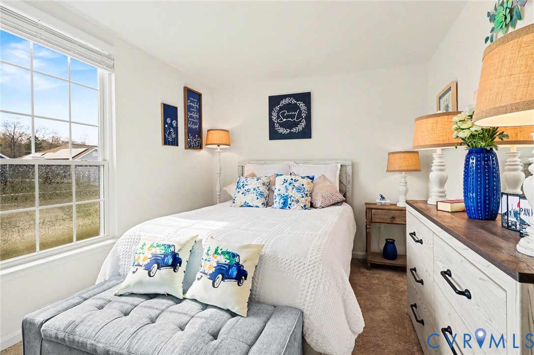 17075 Rollins Road Bowling Green, VA 22427 - Photo 16 of 23 a bedroom with a bed and a window