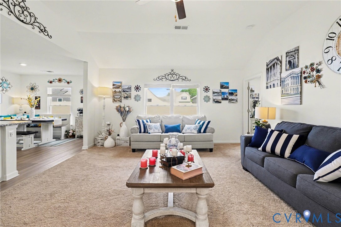 17075 Rollins Road Bowling Green, VA 22427 - Photo 3 of 23 a living room with furniture and a couch