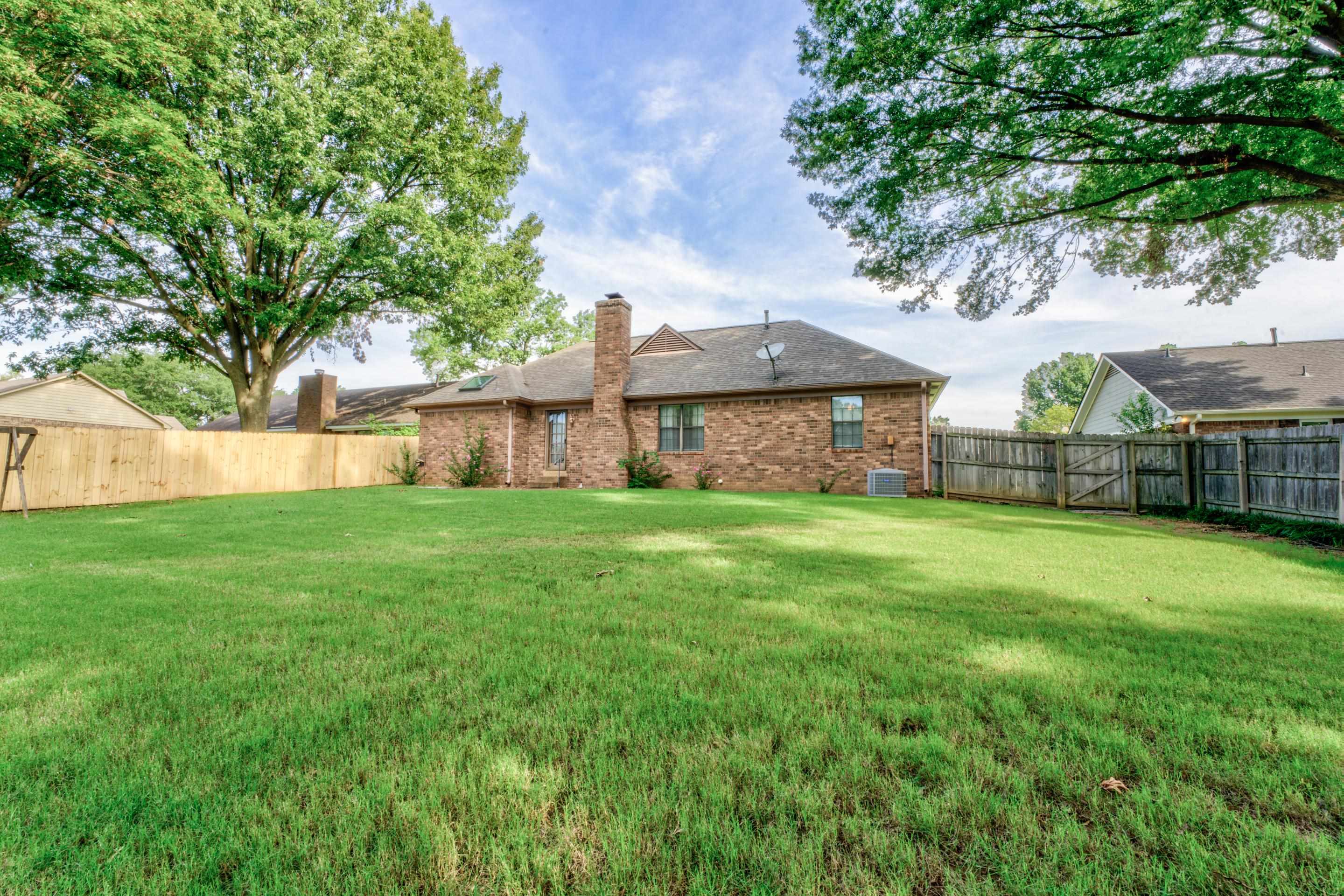 6433 Yale Road Bartlett, TN 38134 - Photo 23 of 24 a view of a house with a yard
