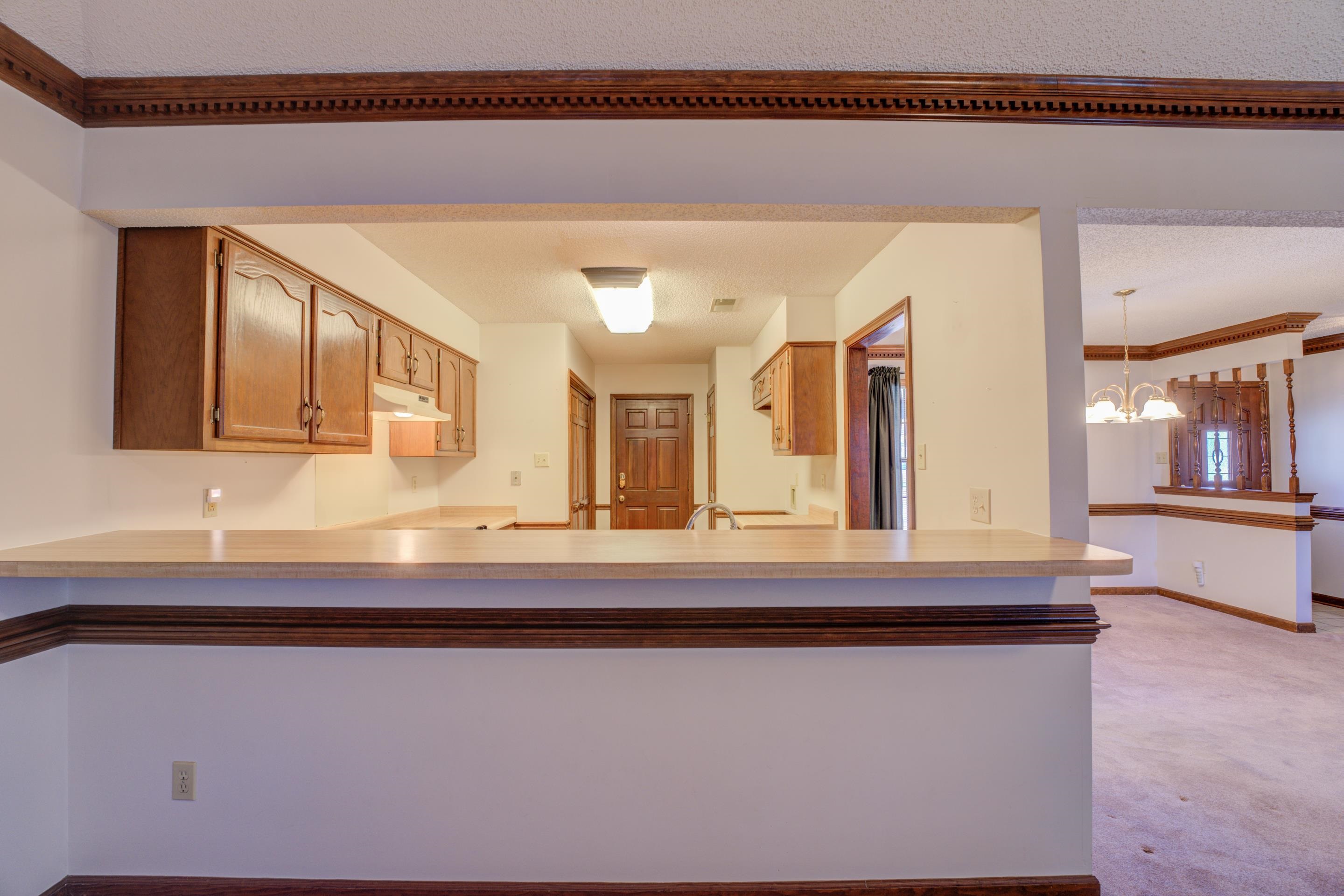 6433 Yale Road Bartlett, TN 38134 - Photo 6 of 24 a view of living room with granite countertop furniture and fireplace