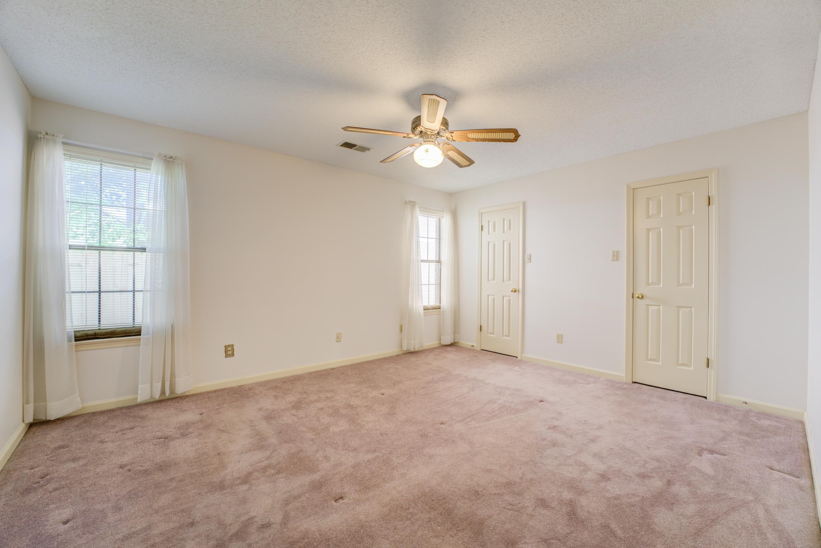 6433 Yale Road Bartlett, TN 38134 - Photo 9 of 24 a view of an empty room with a window