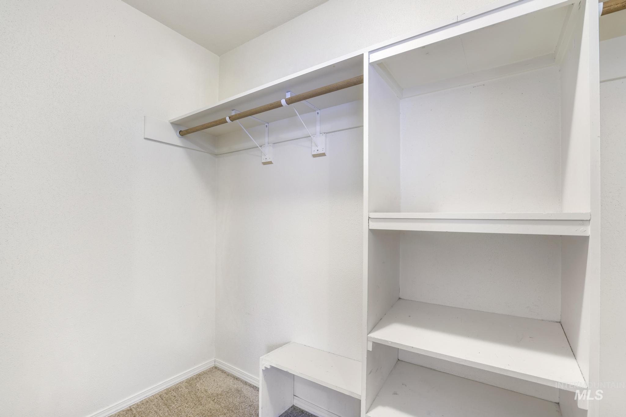 1218 Inca Drive Twin Falls, ID 83301 - Photo 17 of 27 Walk in closet featuring light colored carpet