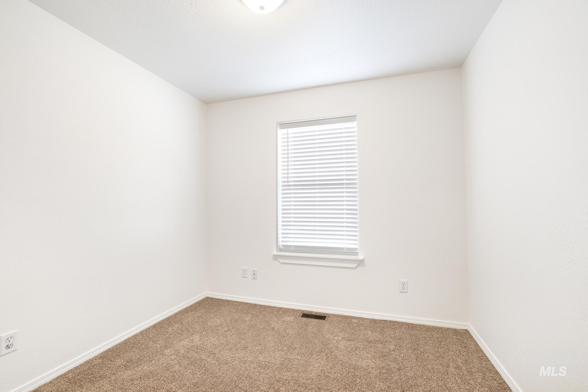 1218 Inca Drive Twin Falls, ID 83301 - Photo 21 of 27 Spare room featuring carpet flooring and baseboards