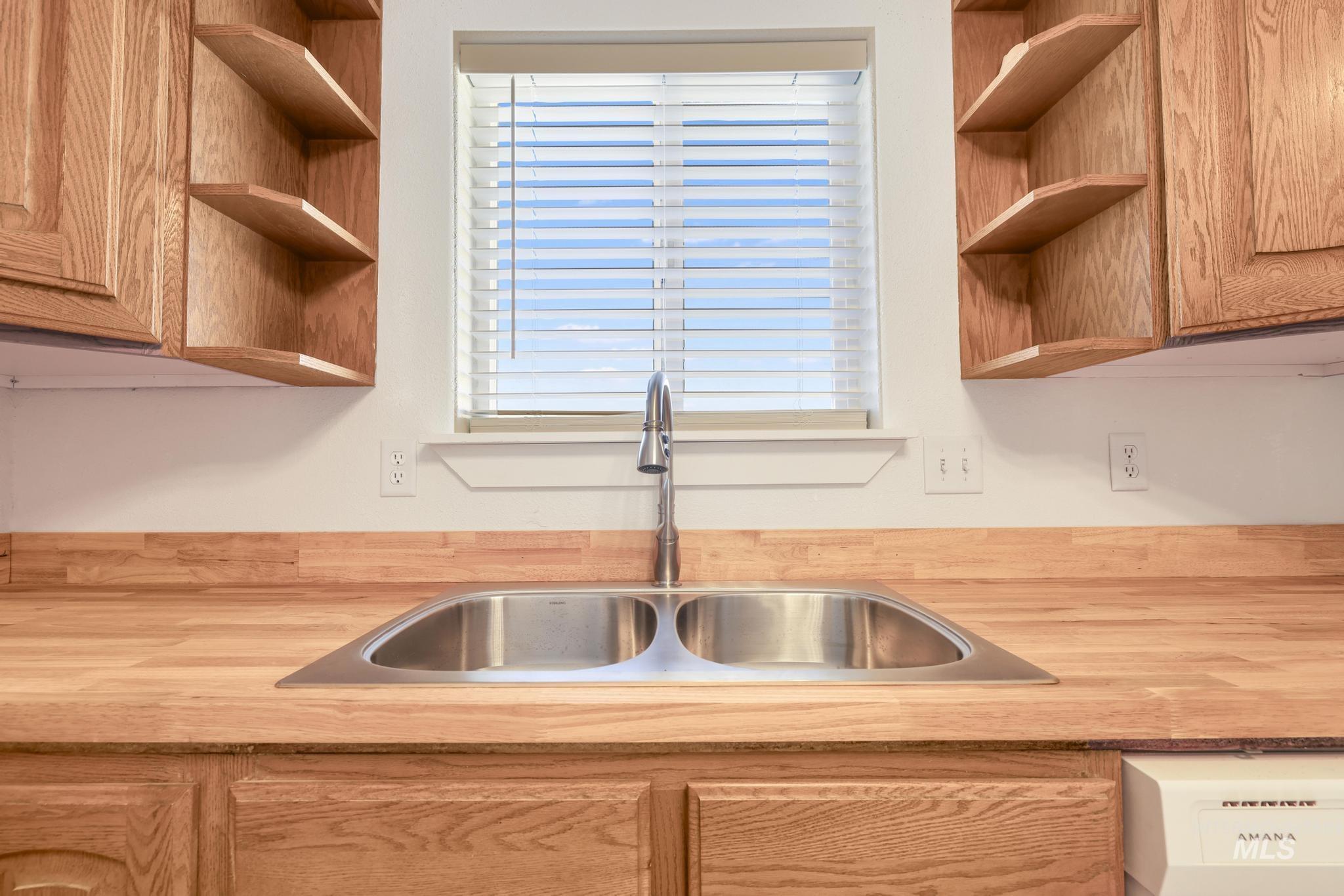 1218 Inca Drive Twin Falls, ID 83301 - Photo 9 of 27 Kitchen with open shelves and light countertops