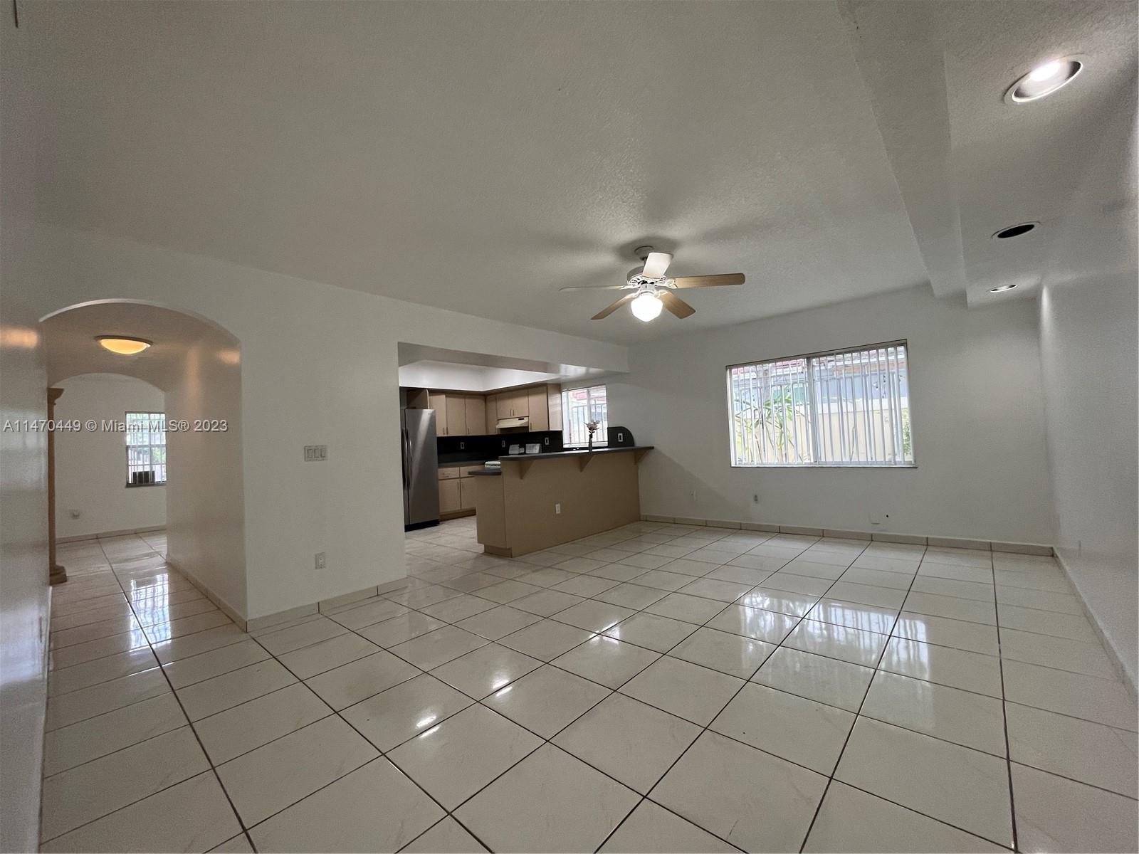 2988 Southwest 11th Street, Unit 2988 Miami, FL 33135 - Photo 2 of 22 a view of a electric appliances in a room