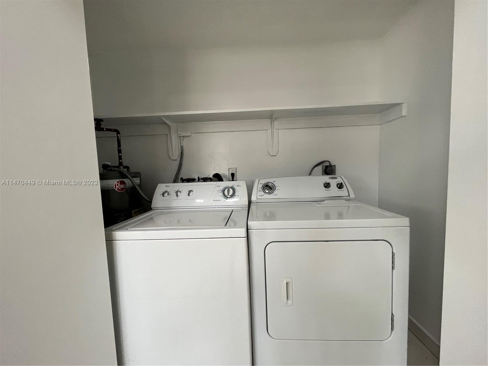 2988 Southwest 11th Street, Unit 2988 Miami, FL 33135 - Photo 21 of 22 a utility room with dryer and washer