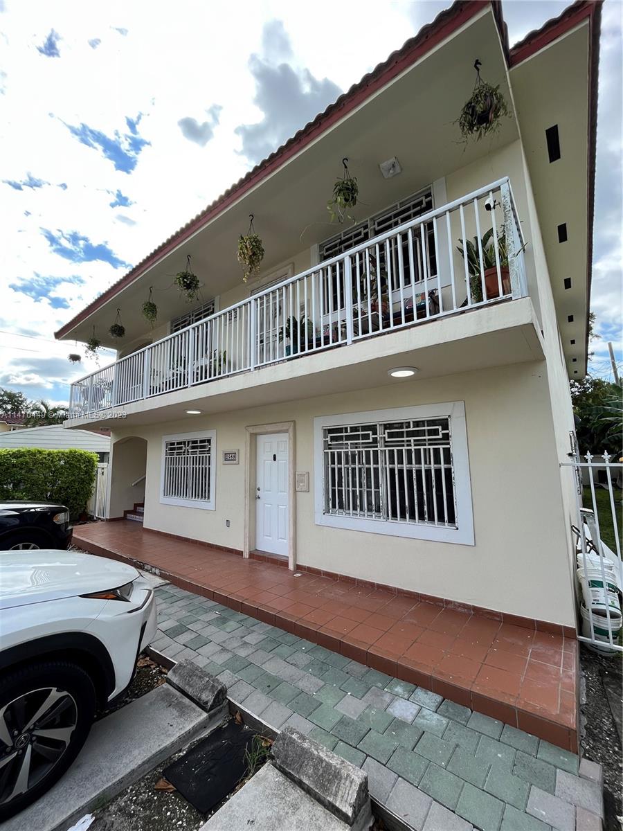2988 Southwest 11th Street, Unit 2988 Miami, FL 33135 - Photo 22 of 22 a view of a house with a deck