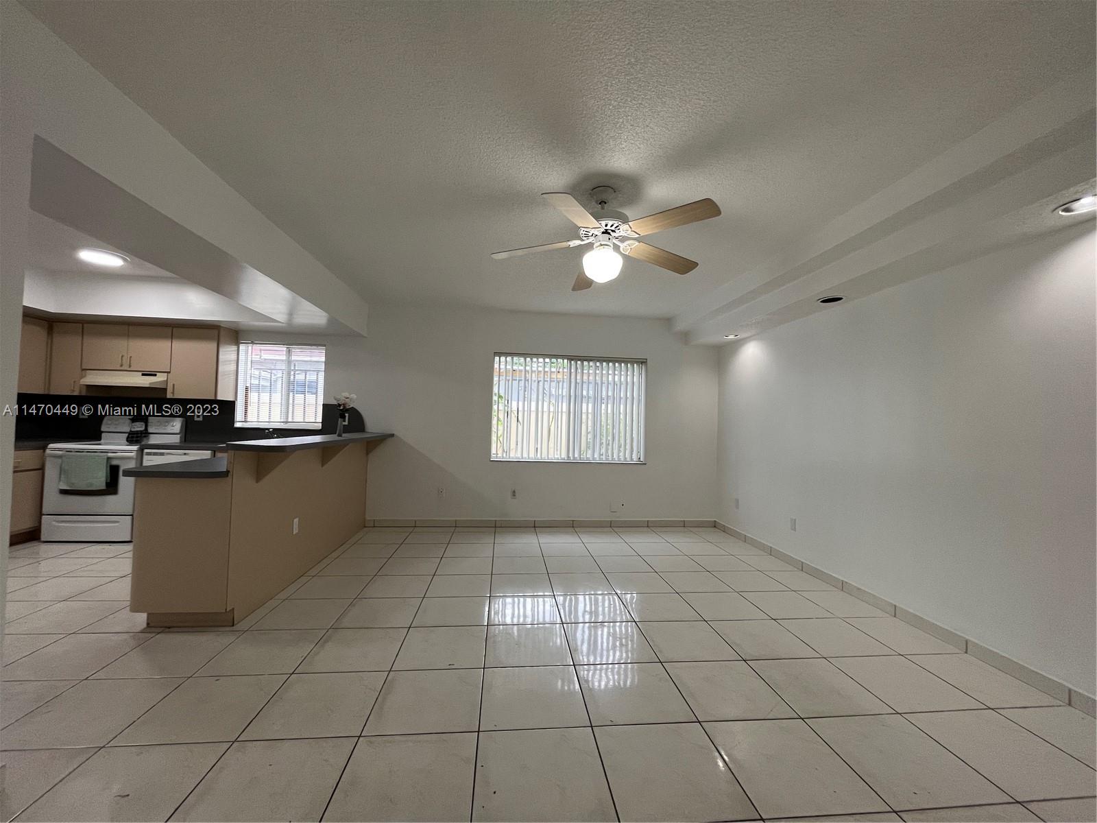 2988 Southwest 11th Street, Unit 2988 Miami, FL 33135 - Photo 5 of 22 a view of kitchen with windows