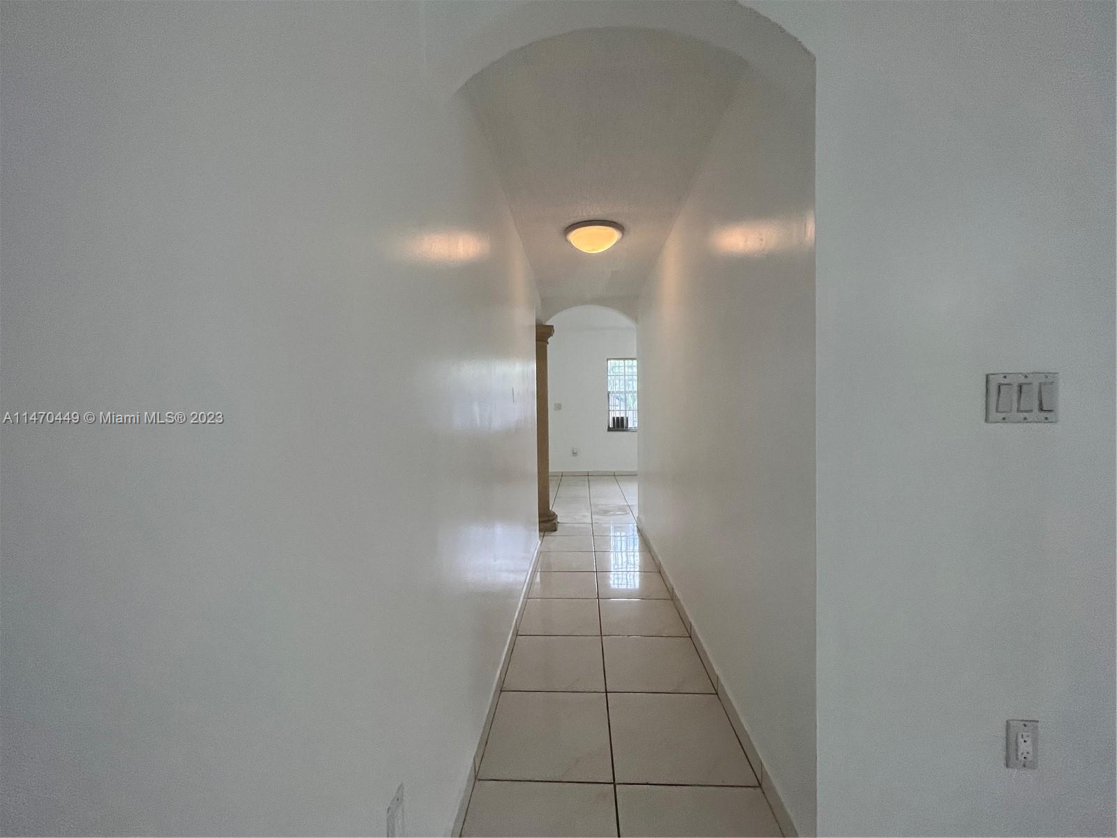 2988 Southwest 11th Street, Unit 2988 Miami, FL 33135 - Photo 7 of 22 a view of a hallway