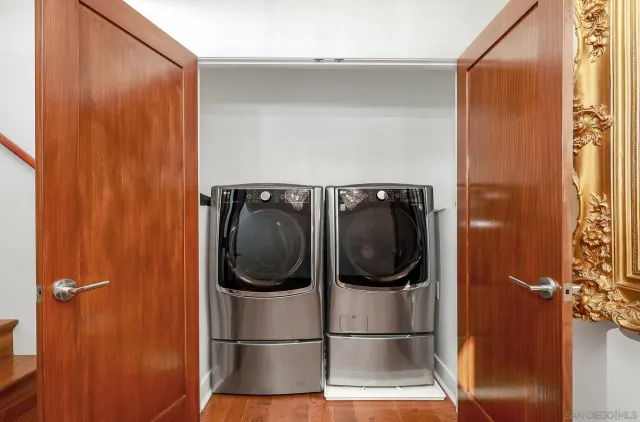 a utility room with dryer and washer
