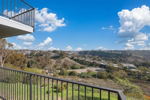 a view of a city from a balcony