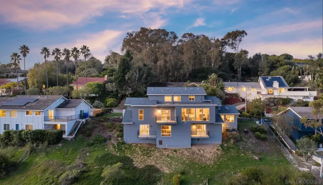 a aerial view of a house with a garden