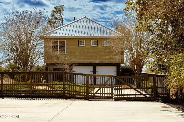 $699,999 | 7325 Suwanee Avenue, Southport, FL 32409