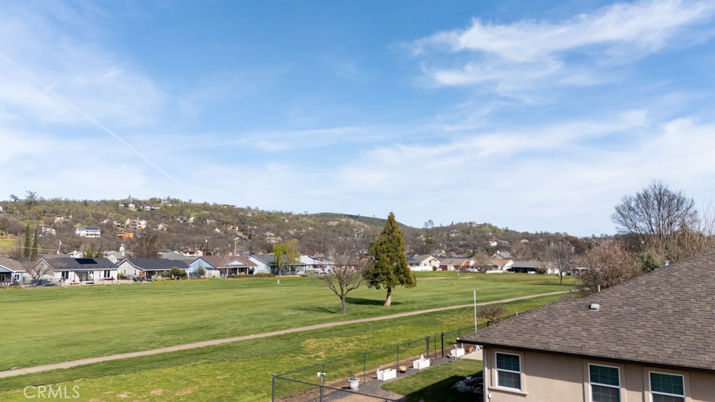 18482 Spyglass Road Hidden Valley Lake, CA 95467 - Photo 11 of 11 a view of grassy field with mountain