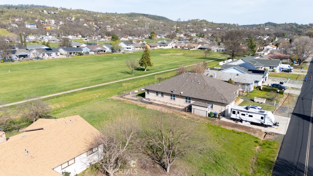 18482 Spyglass Road Hidden Valley Lake, CA 95467 - Photo 5 of 11 an aerial view of a house with a swimming pool