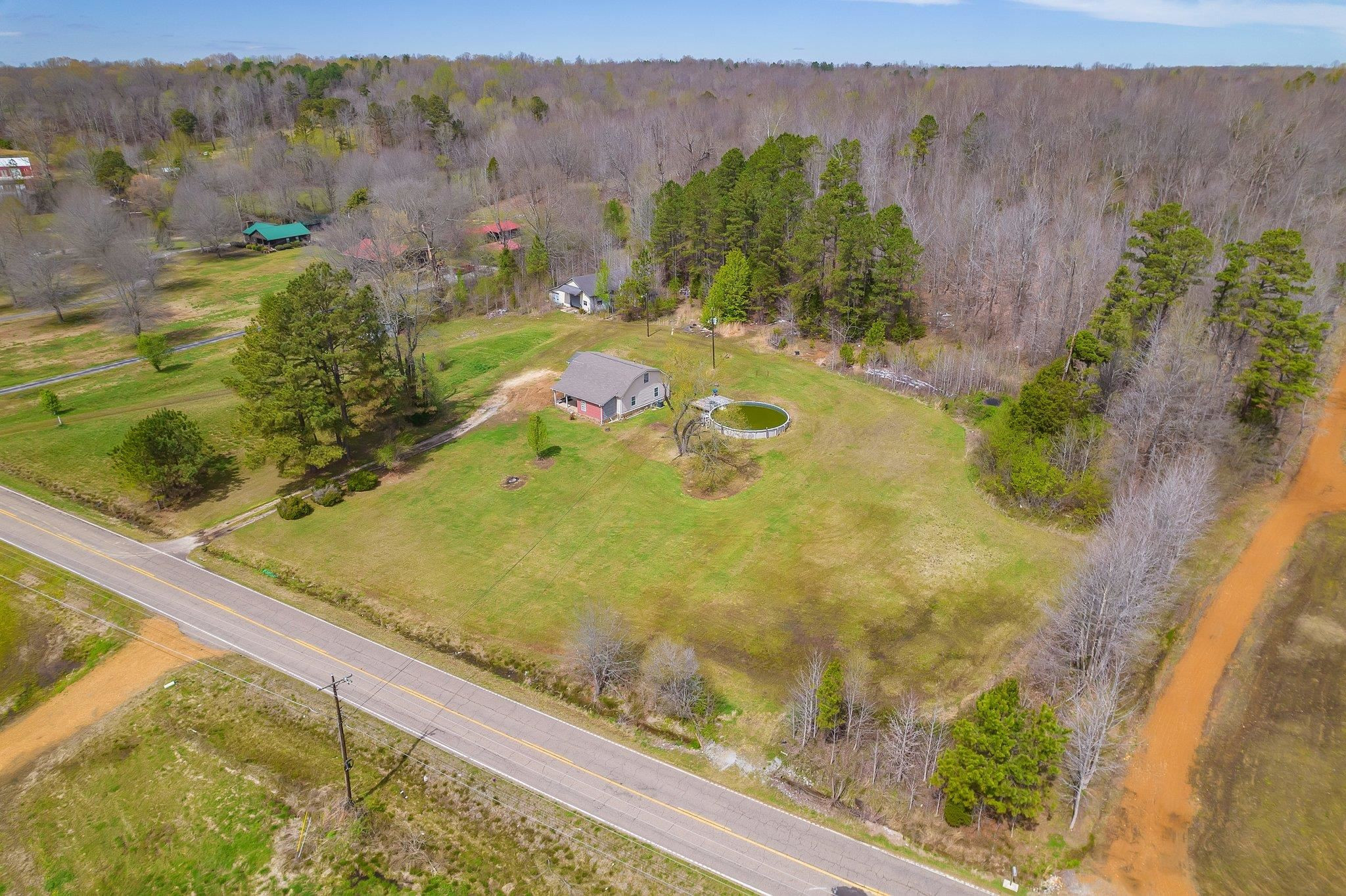 3249 Beech Bluff Road Beech Bluff, TN 38313 - Photo 11 of 32 a view of a garden from a balcony