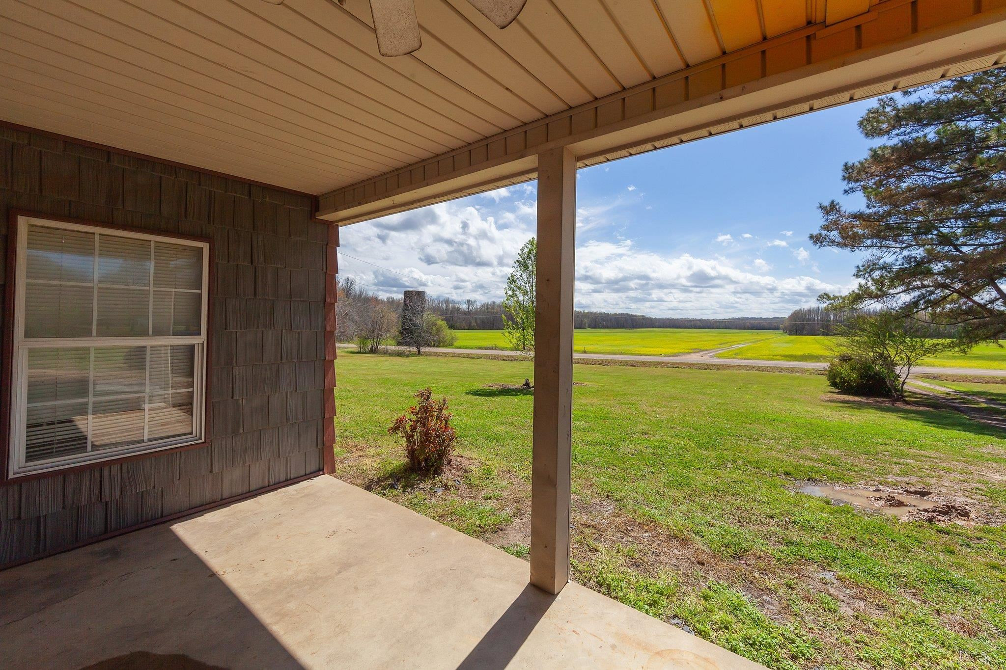3249 Beech Bluff Road Beech Bluff, TN 38313 - Photo 17 of 32 a view of a porch and wooden floor