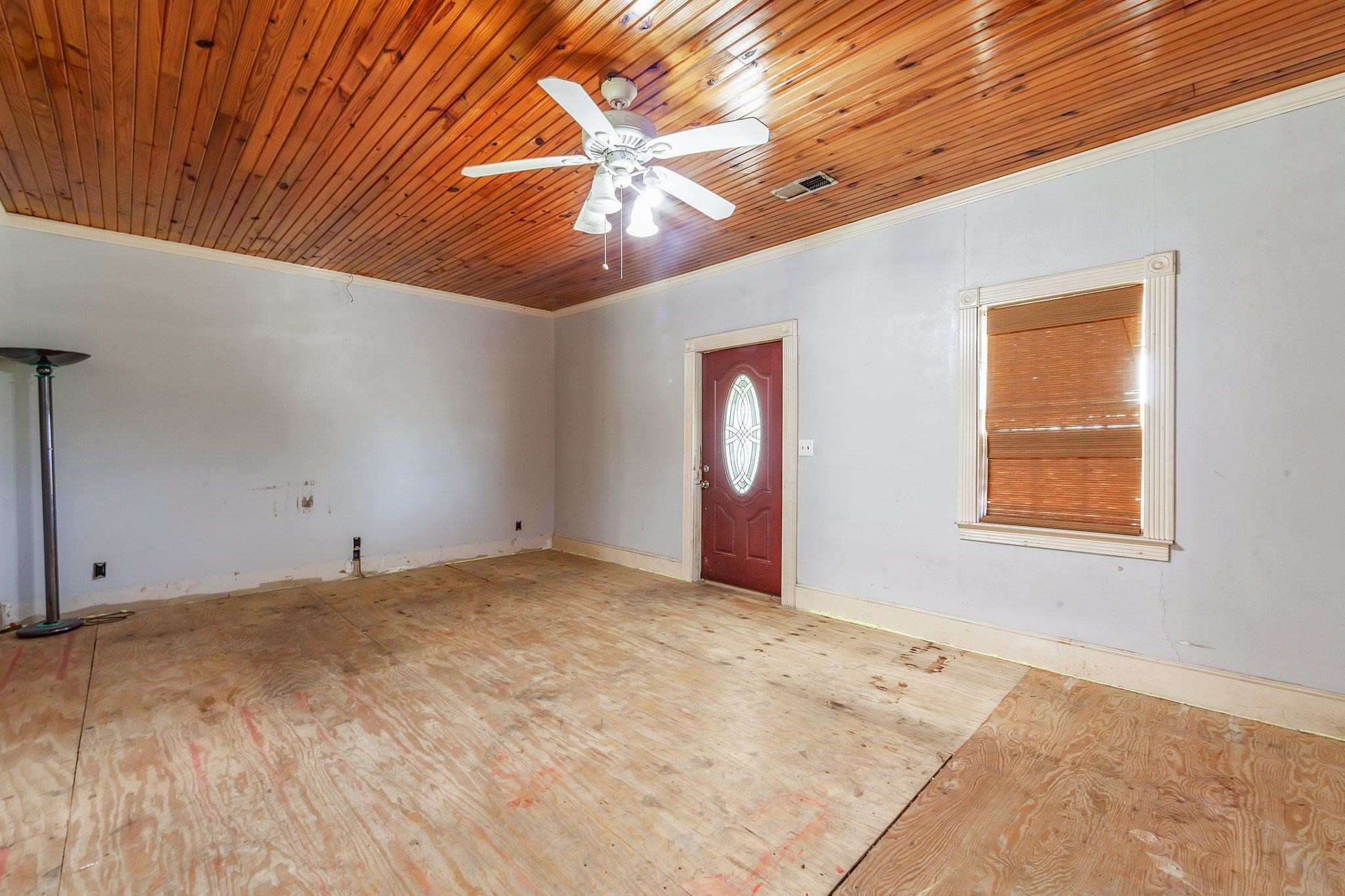 3249 Beech Bluff Road Beech Bluff, TN 38313 - Photo 20 of 32 a view of an empty room with window and chandelier fan