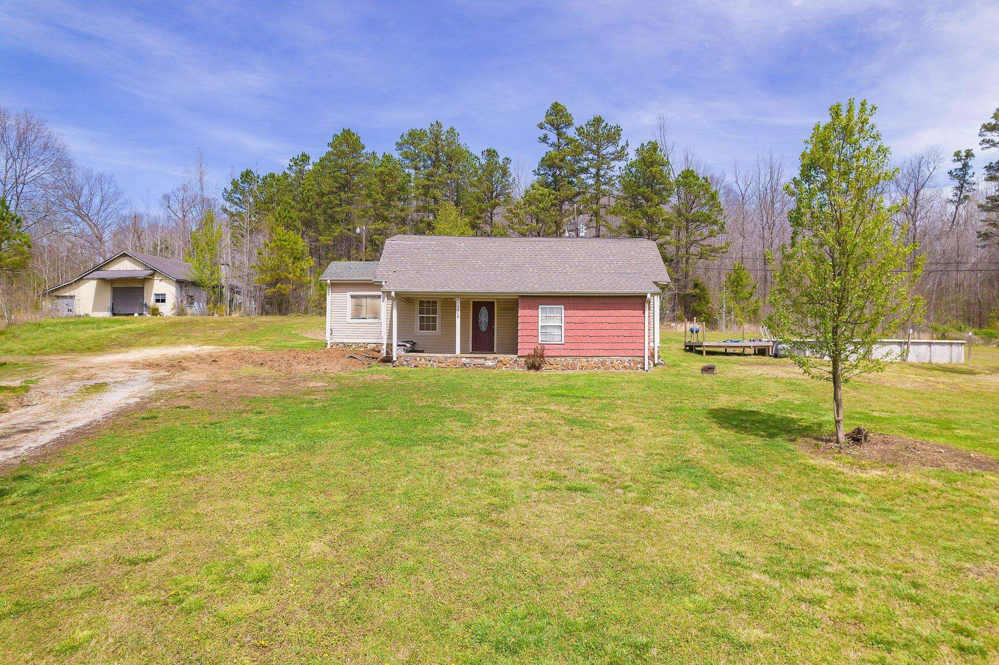 3249 Beech Bluff Road Beech Bluff, TN 38313 - Photo 4 of 32 a front view of house with yard and green space