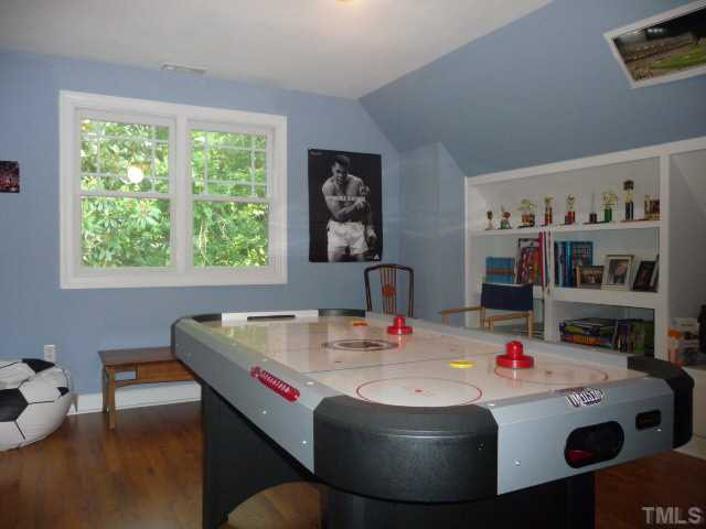 541 Pace Street Raleigh, NC 27604 - Photo 11 of 12 The 16 ft long second room on the third level also has built-in shelves and a desk. Bonus Room
