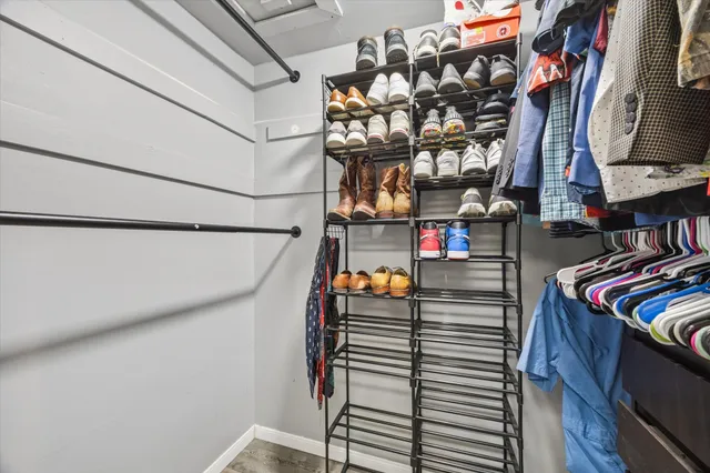 a bedroom with a workspace